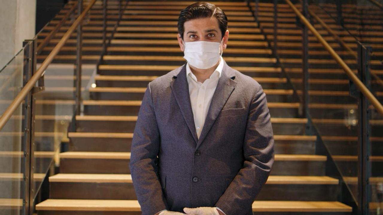 Holiday Inn Mumbai International Airport By Ihg Exterior photo A hotel employee wearing a face mask