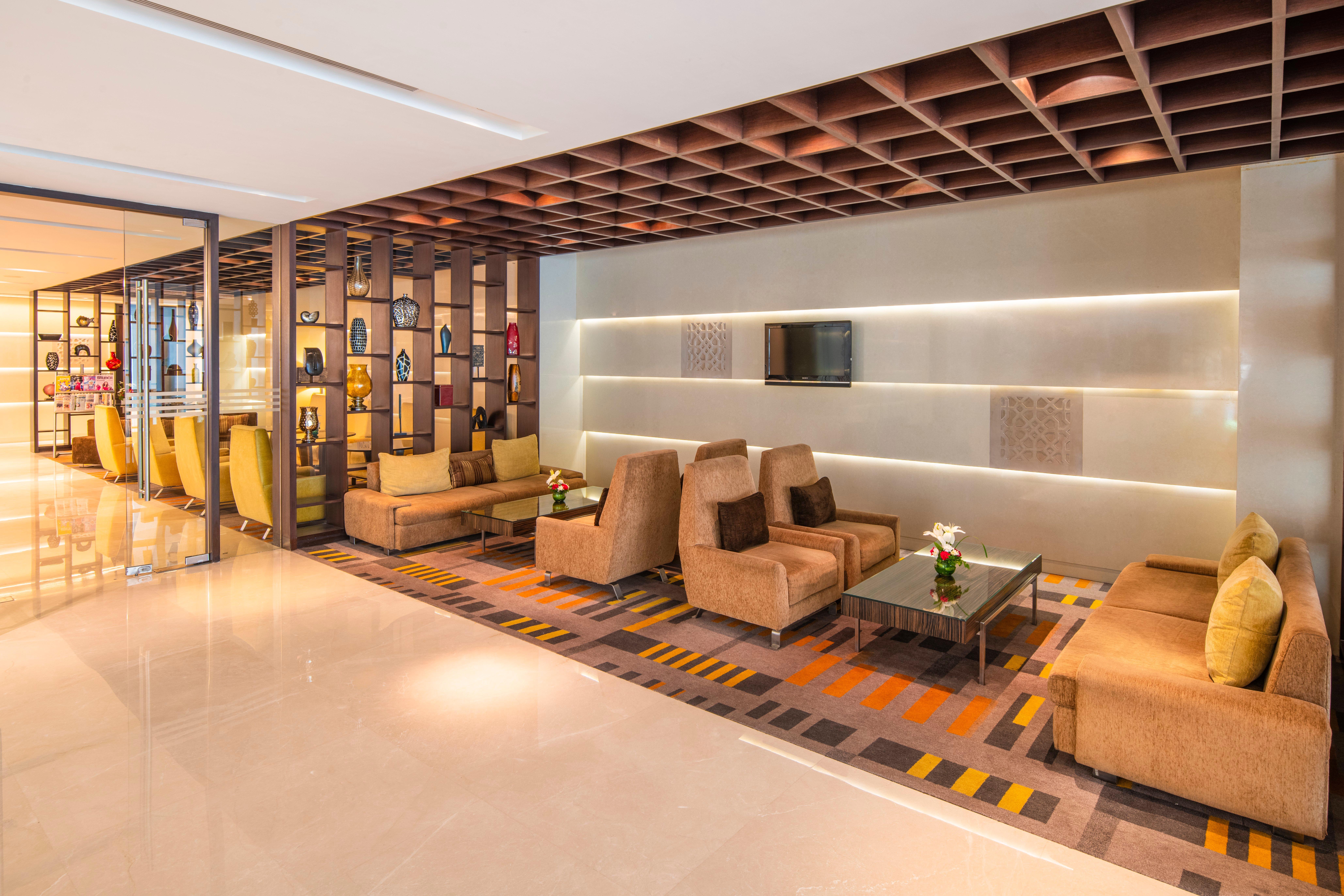 Holiday Inn Mumbai International Airport By Ihg Exterior photo The lounge at the airport